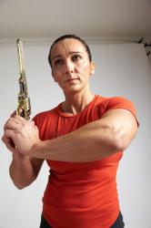 LAURA STANDING POSE WITH GUN